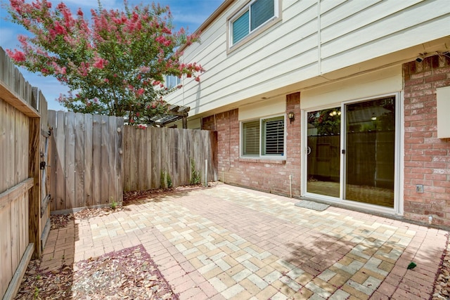 14436 Misty Meadow Ln, Houston, TX 77079 - fenced backyard with a patio