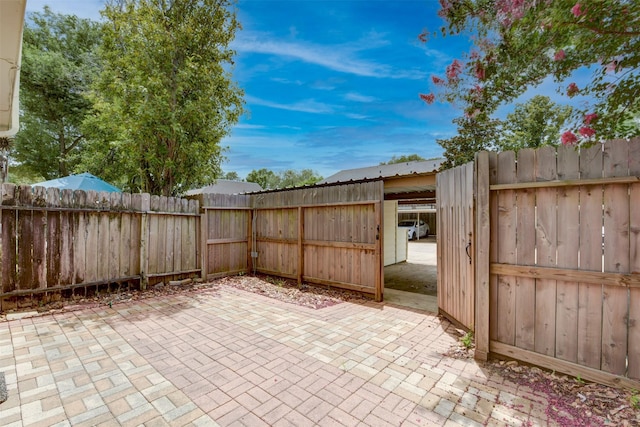 14436 Misty Meadow Ln, Houston, TX 77079 - fenced backyard featuring a patio area
