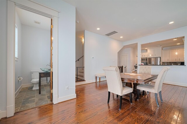 5307 Nett St Unit C, Houston, TX 77007 - dining space featuring hardwood / wood-style floors and recessed lighting