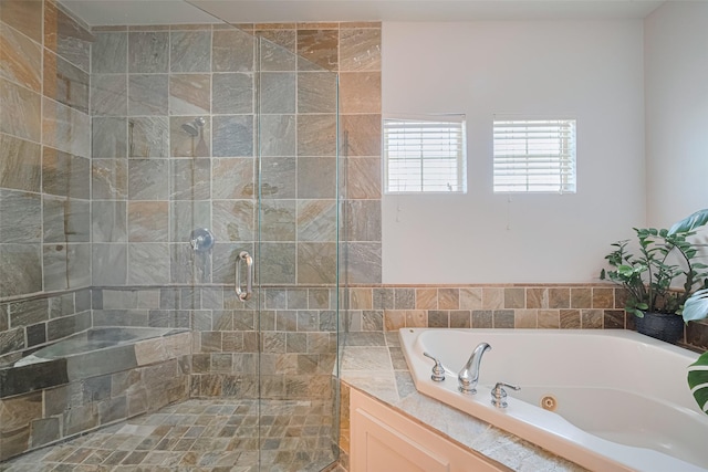 5307 Nett St Unit C, Houston, TX 77007 - bathroom with a jetted tub and a shower stall