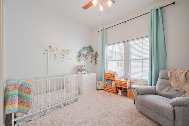 5307 Nett St Unit C, Houston, TX 77007 - bedroom featuring a crib, carpet flooring, and a ceiling fan