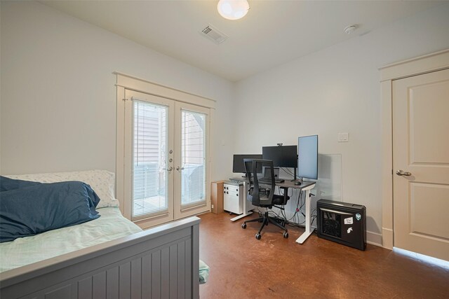5307 Nett St Unit C, Houston, TX 77007 - bedroom with french doors, finished concrete floors, an office area, and access to exterior