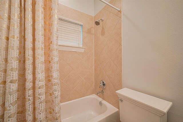 5307 Nett St Unit C, Houston, TX 77007 - bathroom featuring shower / tub combo and toilet