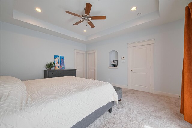 5307 Nett St Unit C, Houston, TX 77007 - carpeted bedroom with a tray ceiling, recessed lighting, and ceiling fan