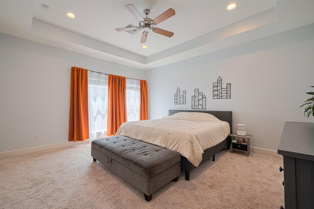 5307 Nett St Unit C, Houston, TX 77007 - bedroom with light colored carpet, recessed lighting, a tray ceiling, and ceiling fan