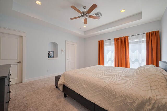 5307 Nett St Unit C, Houston, TX 77007 - carpeted bedroom featuring a tray ceiling, recessed lighting, and a ceiling fan