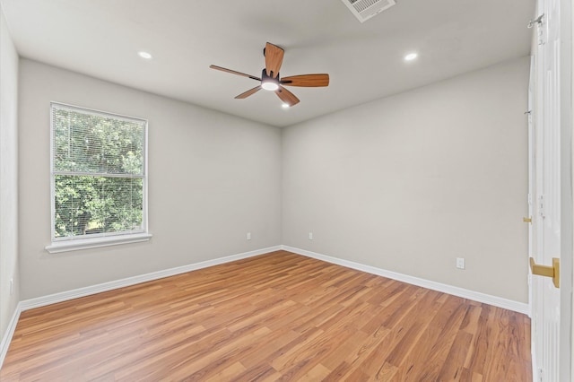 7347 Liberty Ridge Ln, Houston, TX 77049 - spare room featuring light wood-style flooring, a ceiling fan, and recessed lighting