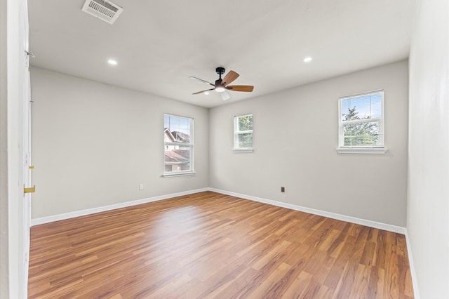 7347 Liberty Ridge Ln, Houston, TX 77049 - empty room featuring a ceiling fan, light wood finished floors, and recessed lighting