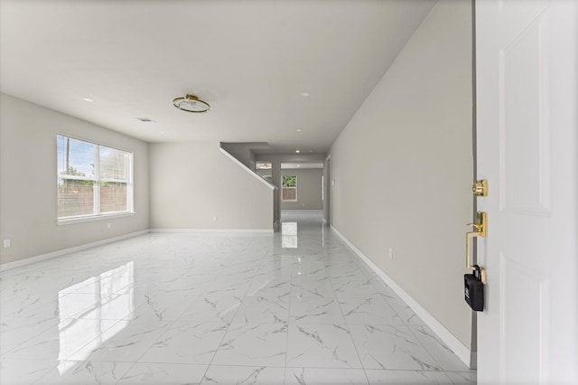 7347 Liberty Ridge Ln, Houston, TX 77049 - foyer featuring marble look tiles and plenty of natural light