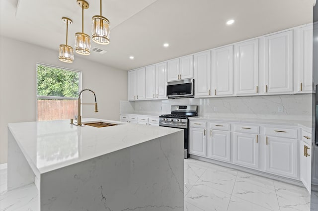 7347 Liberty Ridge Ln, Houston, TX 77049 - kitchen with stainless steel appliances, light marble finish floors, recessed lighting, and white cabinetry