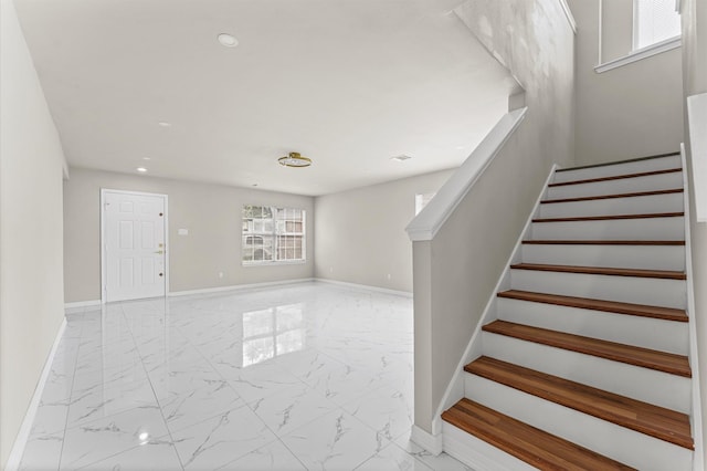 7347 Liberty Ridge Ln, Houston, TX 77049 - staircase featuring marble finish flooring and recessed lighting