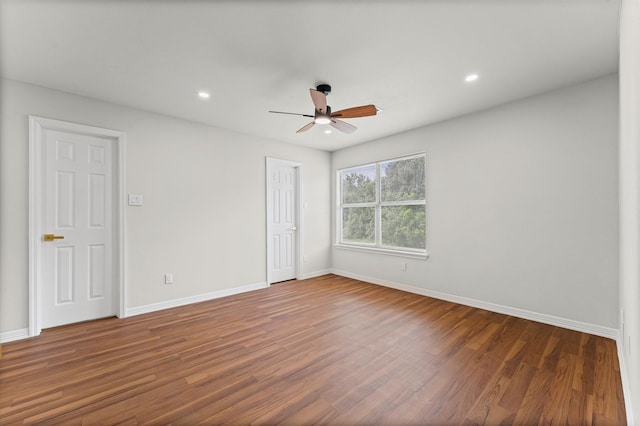 7347 Liberty Ridge Ln, Houston, TX 77049 - unfurnished bedroom with wood finished floors, recessed lighting, and a ceiling fan