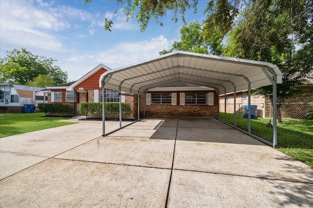 3006 Hartwick Rd, Houston, TX 77093 - view of vehicle parking featuring a detached carport and concrete driveway
