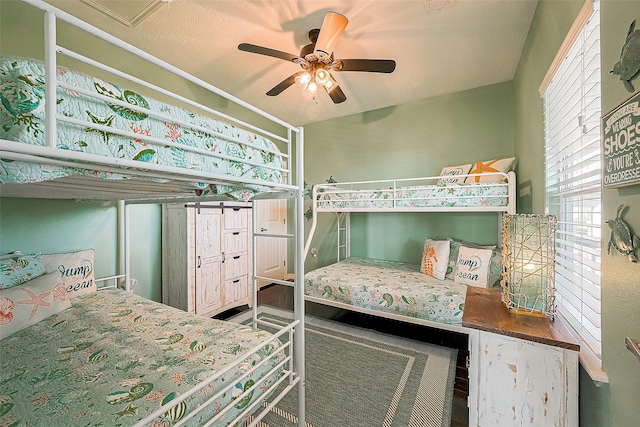 3401 Sand Castle Ln, Port Bolivar, TX 77650 - bedroom with ceiling fan