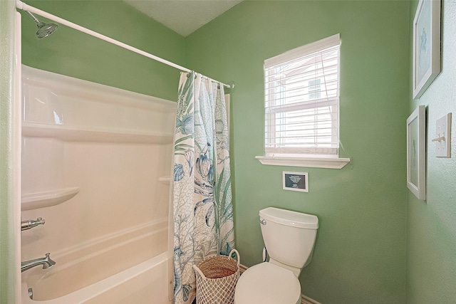3401 Sand Castle Ln, Port Bolivar, TX 77650 - bathroom featuring shower / tub combo and toilet