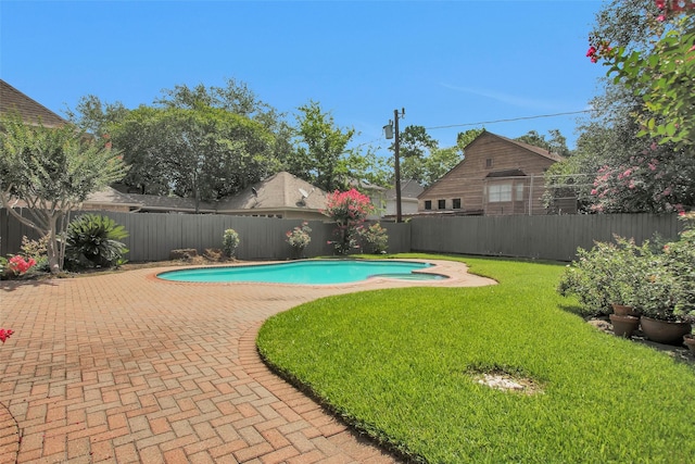 1907 Wagon Gap Trl, Houston, TX 77090 - view of swimming pool featuring a fenced backyard and a patio area