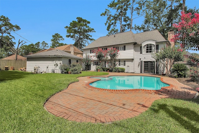 1907 Wagon Gap Trl, Houston, TX 77090 - view of swimming pool featuring a patio area and french doors