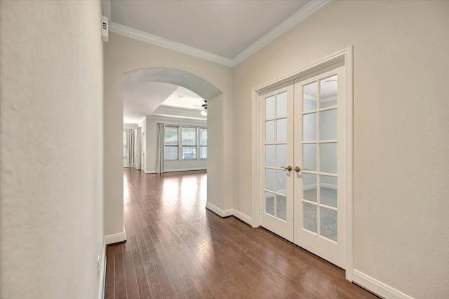 716 Saturnia Ln, League City, TX 77573 - corridor with french doors, arched walkways, crown molding, and dark wood-style flooring