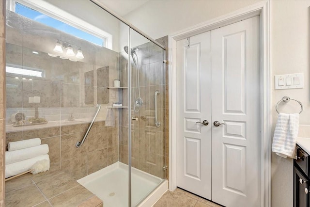 716 Saturnia Ln, League City, TX 77573 - full bathroom featuring a shower stall, tile patterned flooring, and vanity