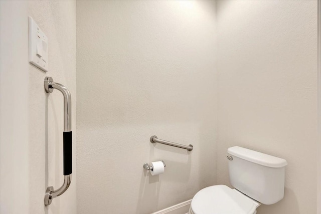 716 Saturnia Ln, League City, TX 77573 - bathroom featuring toilet and baseboards