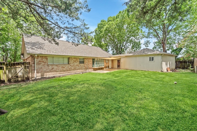 11826 Bandlon Dr, Houston, TX 77072 - back of property featuring brick siding, a shingled roof, and a chimney