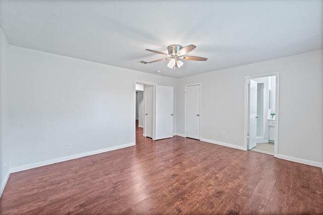 11826 Bandlon Dr, Houston, TX 77072 - unfurnished bedroom with wood finished floors, ensuite bathroom, and ceiling fan