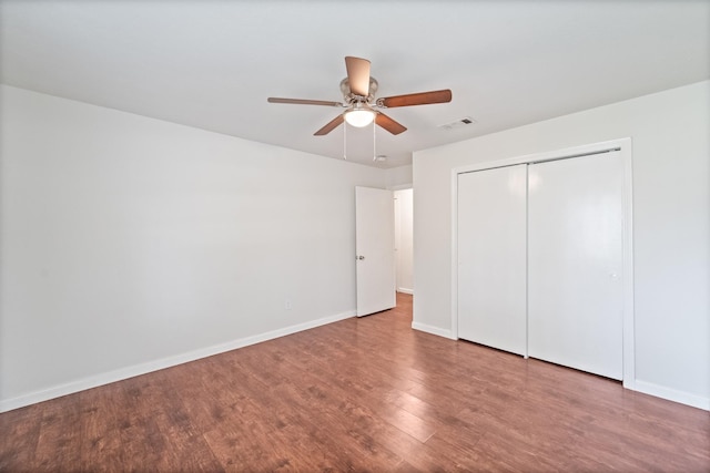 11826 Bandlon Dr, Houston, TX 77072 - unfurnished bedroom featuring wood finished floors, a closet, and ceiling fan