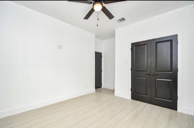 8310 Parnell St, Houston, TX 77051 - unfurnished bedroom with wood finished floors and a ceiling fan