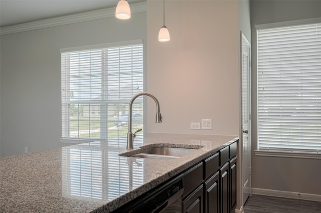 915 Lakeland Cir, Rosharon, TX 77583 - kitchen featuring light stone counters, pendant lighting, and crown molding