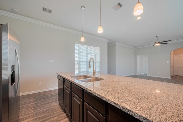 915 Lakeland Cir, Rosharon, TX 77583 - kitchen featuring stainless steel fridge, dishwashing machine, crown molding, wood finished floors, and dark brown cabinets