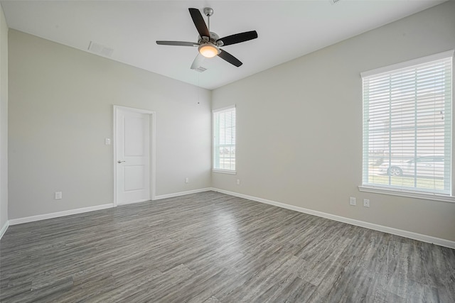 915 Lakeland Cir, Rosharon, TX 77583 - unfurnished room featuring dark wood-type flooring and ceiling fan