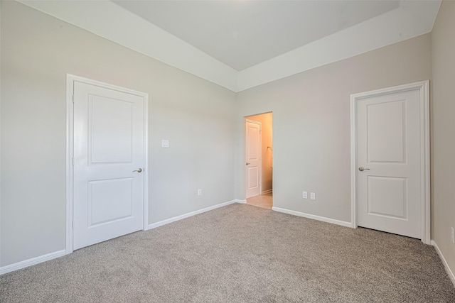 915 Lakeland Cir, Rosharon, TX 77583 - unfurnished bedroom featuring carpet and baseboards