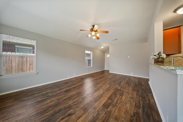 10335 Caribou Cv, Missouri City, TX 77459 - empty room with dark wood-style flooring and ceiling fan