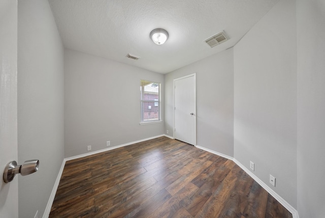 10335 Caribou Cv, Missouri City, TX 77459 - spare room with dark wood-type flooring and baseboards