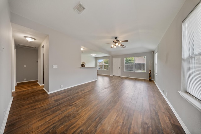 10335 Caribou Cv, Missouri City, TX 77459 - unfurnished living room featuring dark wood-style flooring and ceiling fan