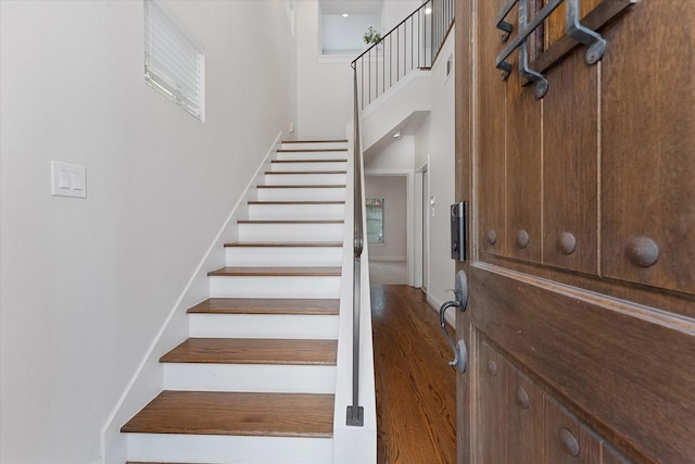 1211 Bonner St, Houston, TX 77007 - stairs with a high ceiling and wood finished floors
