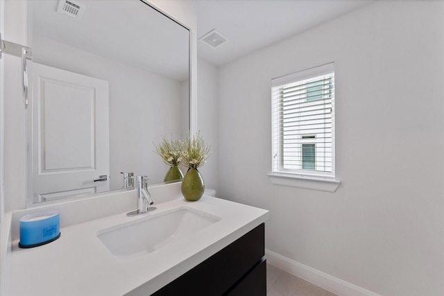 1211 Bonner St, Houston, TX 77007 - bathroom with vanity and baseboards