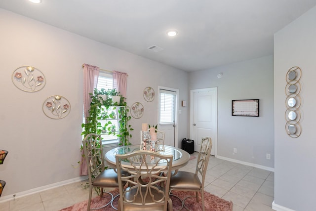 4430 Misty Woods Trl, Richmond, TX 77469 - dining space with light tile patterned floors and baseboards