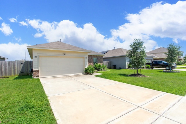 4430 Misty Woods Trl, Richmond, TX 77469 - ranch-style house with brick siding, concrete driveway, and an attached garage