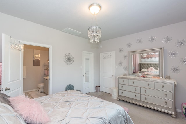 4430 Misty Woods Trl, Richmond, TX 77469 - bedroom featuring a chandelier and ensuite bath