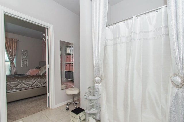 4430 Misty Woods Trl, Richmond, TX 77469 - ensuite bathroom with tile patterned flooring and a shower with curtain