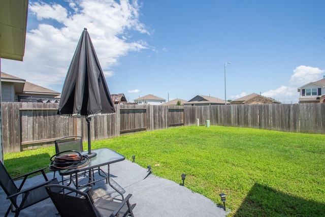4430 Misty Woods Trl, Richmond, TX 77469 - fenced backyard with a patio area