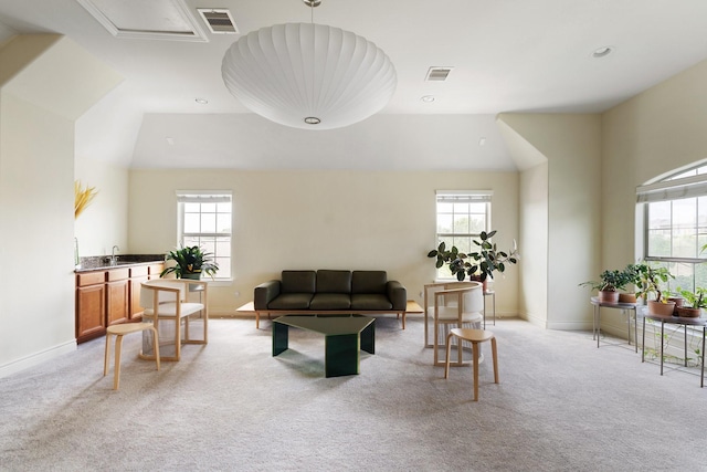 9103 Creekstone Lake Dr, Houston, TX 77054 - living room featuring light carpet, lofted ceiling, and recessed lighting