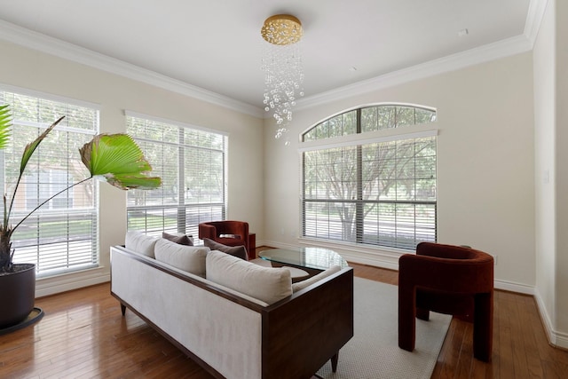 9103 Creekstone Lake Dr, Houston, TX 77054 - living area with healthy amount of natural light, crown molding, and wood-type flooring