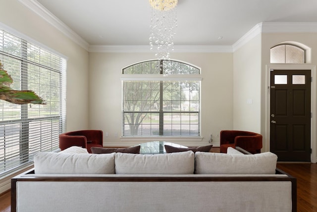 9103 Creekstone Lake Dr, Houston, TX 77054 - living area featuring a chandelier, healthy amount of natural light, dark wood-type flooring, and crown molding