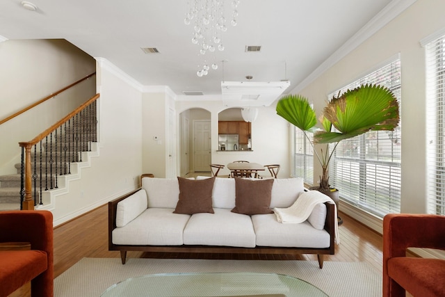 9103 Creekstone Lake Dr, Houston, TX 77054 - living room with wood finished floors, stairs, and crown molding
