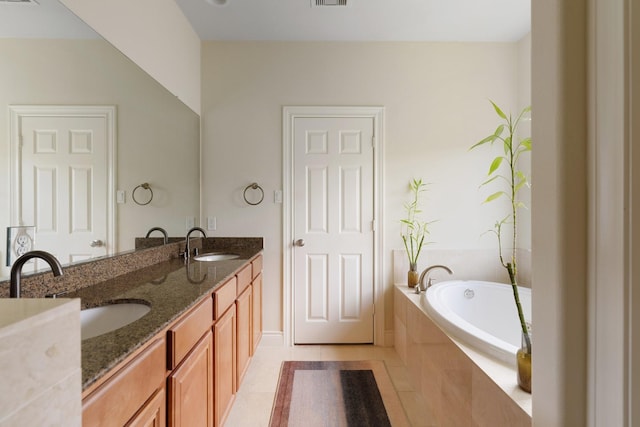 9103 Creekstone Lake Dr, Houston, TX 77054 - full bathroom with double vanity, a bath, and tile patterned flooring
