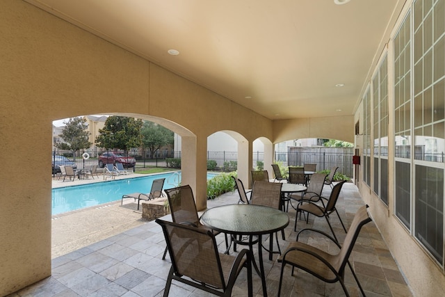 9103 Creekstone Lake Dr, Houston, TX 77054 - view of patio / terrace featuring a community pool