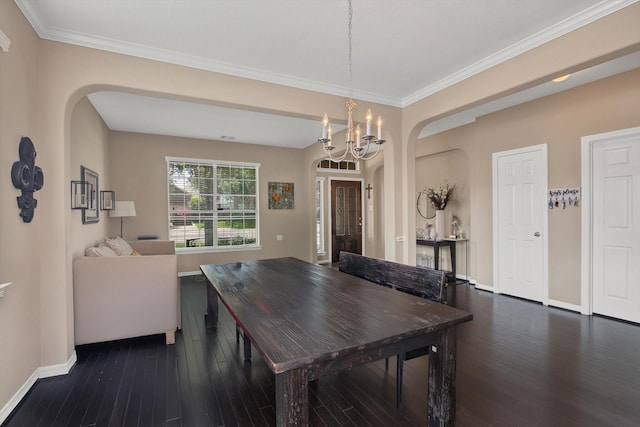 3215 W Trail Dr, Pearland, TX 77584 - dining room featuring arched walkways, dark wood finished floors, a chandelier, and ornamental molding