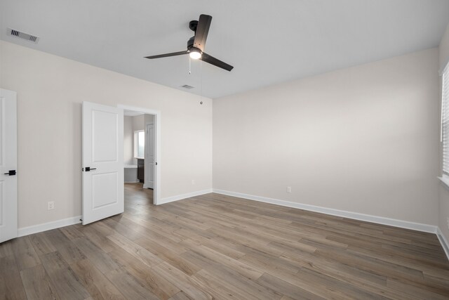 3126 Banyan Dr, Texas City, TX 77510 - unfurnished bedroom with wood finished floors and a ceiling fan